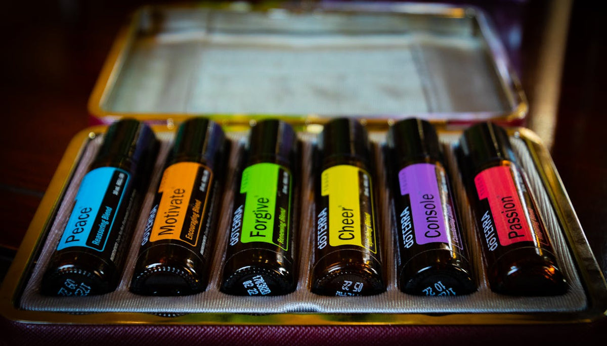 A case of essential oils with coloured labels